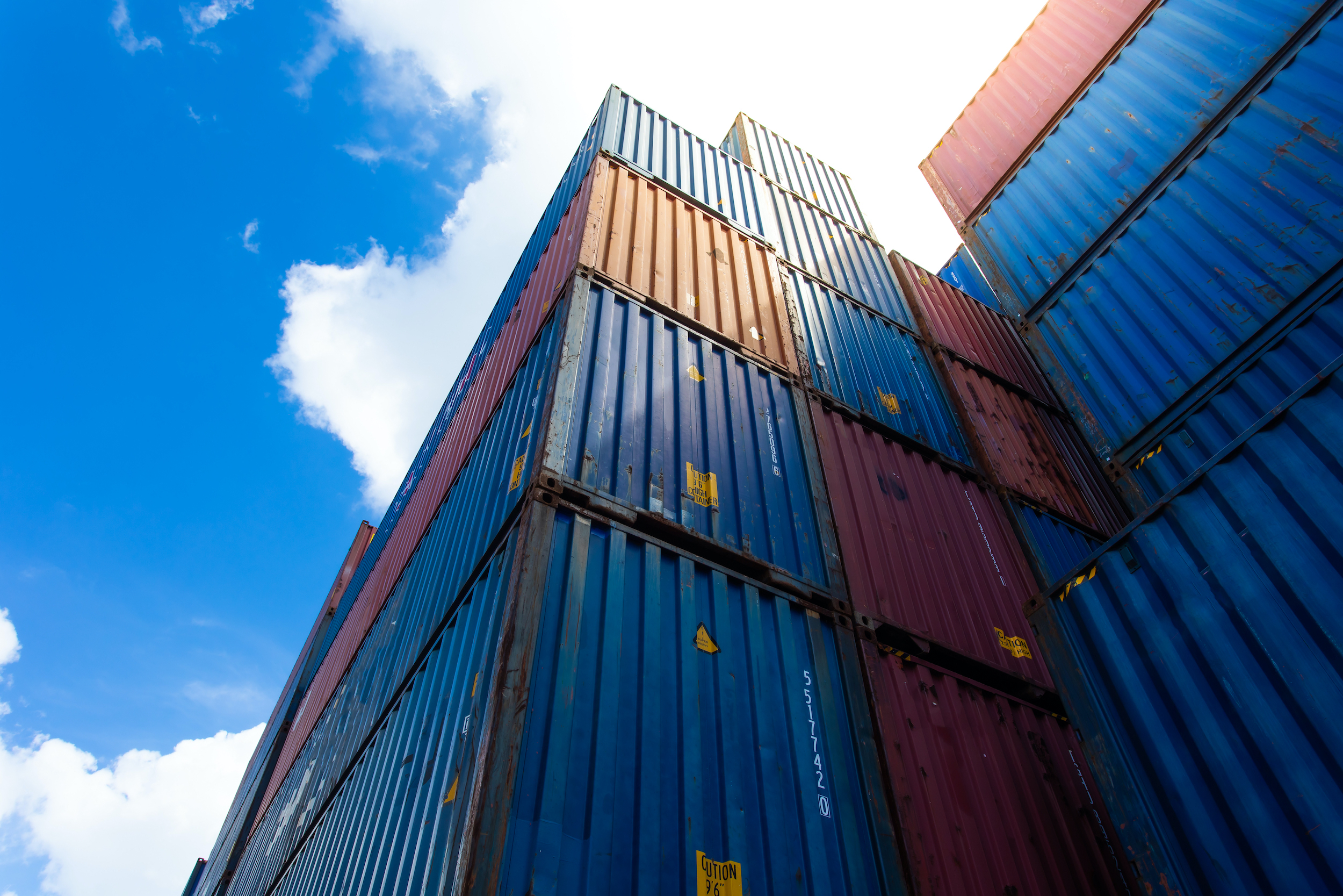 shipping containers stacked on one another